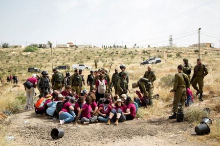 Palestinian and international activists demand protection for residents of south Hebron hills