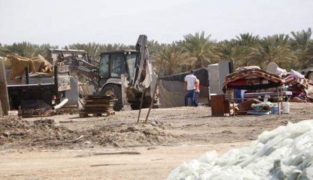 Israeli occupation forces remove 12 residential tents, water tanks, animal shelters in Humsa al-Bqaia community