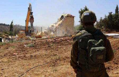 Two shops in an East Jerusalem neighborhood and built 50 years ago demolished by Israel without prior notice, says owner