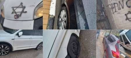 سلفيت: مستوطنون يعطبون إطارات 10 مركبات ويخطّون شعارات عنصرية
