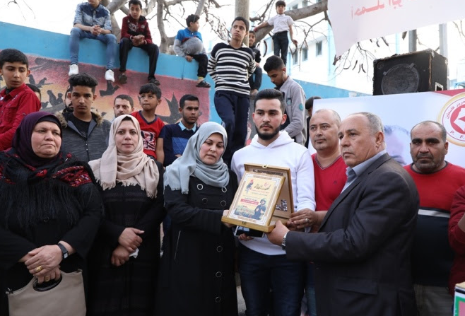 الجبهة الشعبية تحيي الذكرى الأولى لرحيل شهيد مسيرات العودة الشهيد الصحفي أحمد أبو حسين