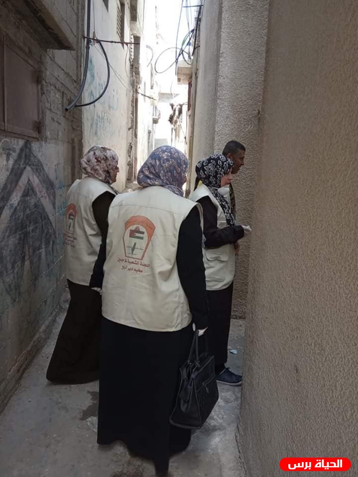 اللجنة الشعبية للاجئين بدير البلح تطلق حملة خليك بالبيت