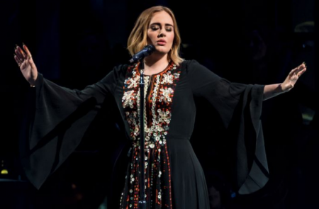 Adele wears 2016 Glastonbury dress while watching her presentation at home