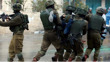 Israel detains Palestinian youth during his brother’s trial