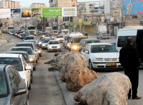 Israeli powers confine Palestinian at Qalandia checkpoint in Jerusalem