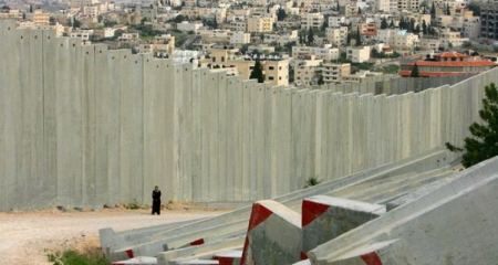 A tiny fraction of Palestinians granted permits to reach their land trapped by separation barrier - Group