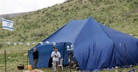 Israeli settlers set up tents at a Palestinian-owned land near Nablus