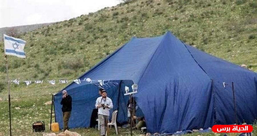 Israeli settlers set up tents at a Palestinian-owned land near Nablus