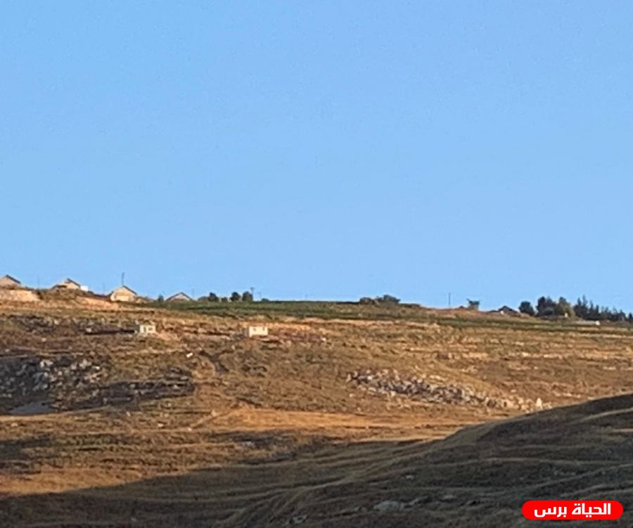In an effort to block Israeli settlers from taking over land near a water well, Palestinians clash with soldiers