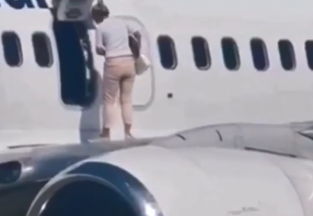 The stunning second a traveler went for a stroll on a plane wing