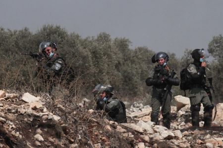 Israeli forces raze Palestinian-owned land in Hebron-area towns