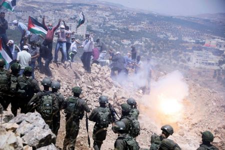 Dozens suffocate as Israeli forces crackdown on anti-settlement rally east of Nablus