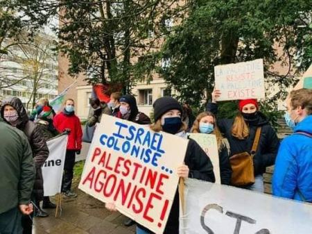 Activists hold a stand in Brussels in protest of Israeli occupation